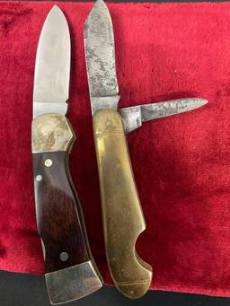 Pair of Folding Pocket Knives, Bobcat engraved blade Western S-521 & Brass handled Rem UMC R219