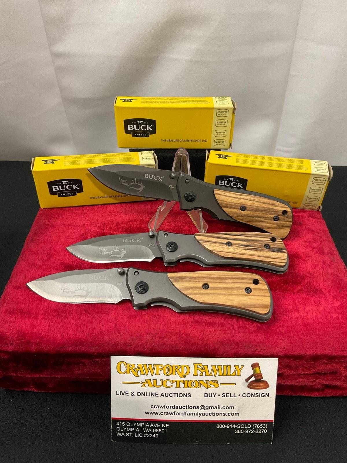 Trio of Modern Buck Folding Pocket Knives, 3x X35, in original boxes