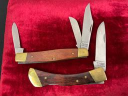 Pair of Vintage KA-BAR Folding Pocket Knives, Models 1109 & 1182, Brass and Wooden Handles