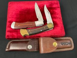 Pair of Buck Folding Hunting Knives, models 110 Hunter & 532 Legacy, Wooden handles