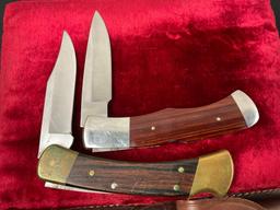 Pair of Buck Folding Hunting Knives, models 110 Hunter & 532 Legacy, Wooden handles