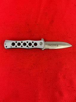 2 pcs Modern Steel Hunting Knives. 1x Western 19072 NIB. 1x Smith & Wesson CK6A. See pics.