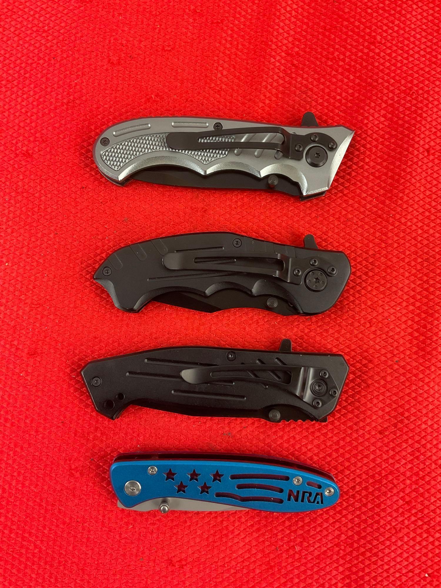 4 pcs Super Knife Steel Folding Blade Pocket Knives Assortment. 1x NRA Logo. NIB. See pics.