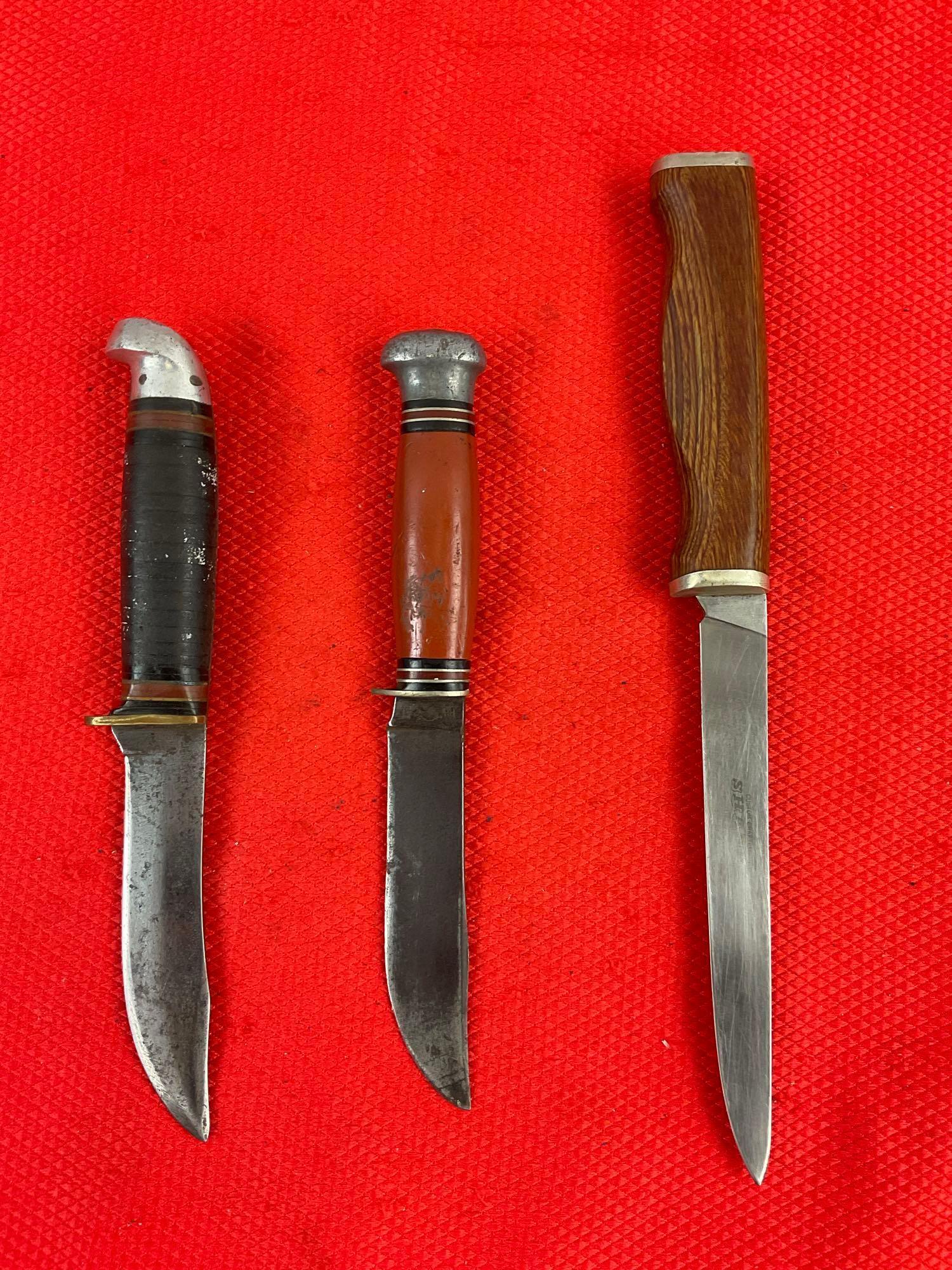 3 pcs Vintage Steel Fixed Blade Hunting Knives w/ Sheathes. 2x Remington, 1x Sharp DF 60. See pics.