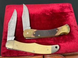 Pair of Schrade Folding Pocket Knives, models 7-OT & SC500 Scrimshaw handle w/ Leather Sheaths