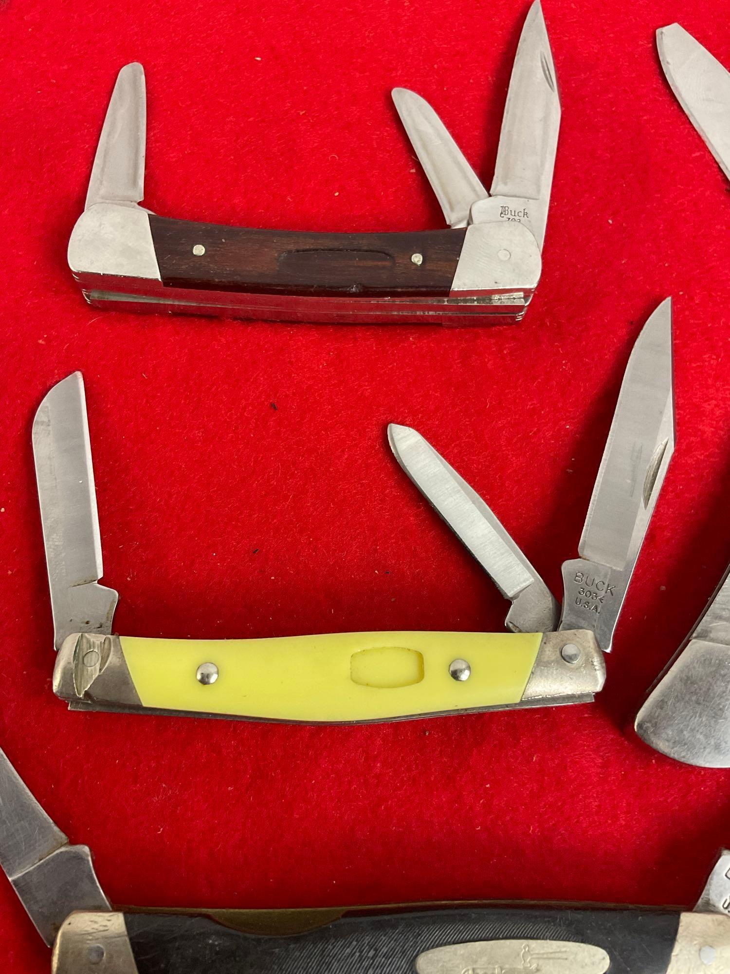 Collection of 4 Buck Folding Blade Pocket Knives Numbered - 703, 501+, 303, & 313.