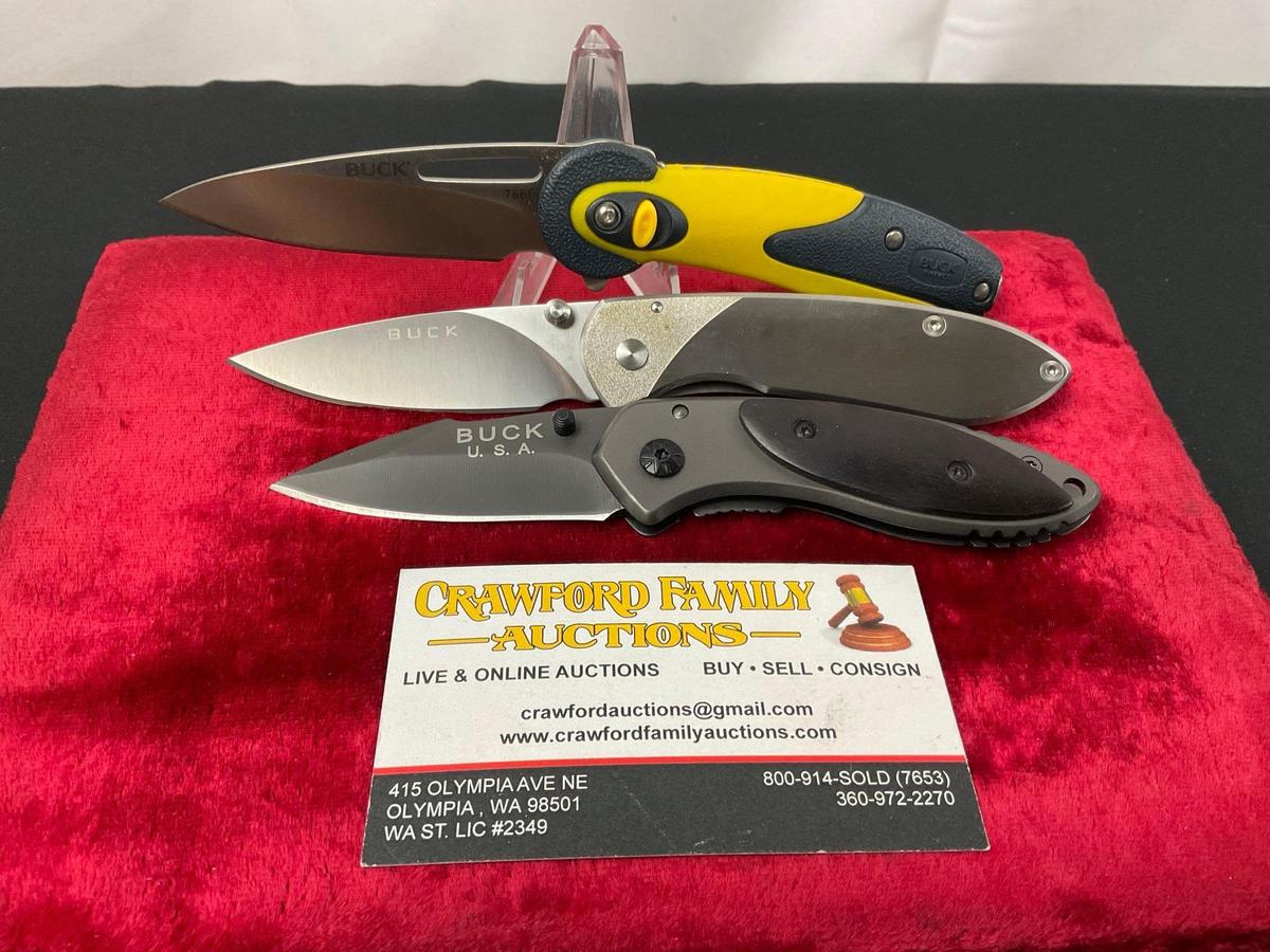 Trio of Modern Buck Folding Pocket Knives, models X11, 327 Nobleman, 766 Revel Yellow Button Lock