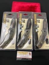 Trio of NIB Schrade model SG8RMCP Folding Knives, sealed in packaging, w/ nylon sheaths