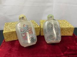 Pair of Chinese Reverse Painted Snuff Bottles, Group of Boys & Mountain Village