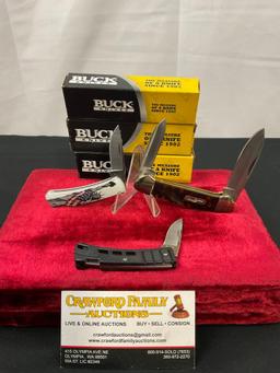 Trio of Buck Folding Knives, models 389 Canoe, 425 MiniBuck, 525 Gentleman w/ Statue of Liberty