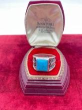Sterling silver men's ring with large turquoise stone & nugget look detail - marked on inner band,