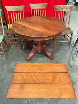 Vintage Wheeled Extending Wooden Dining Table w/ 3 Leaves & 5 pcs Spindle Back Chairs. See pics.