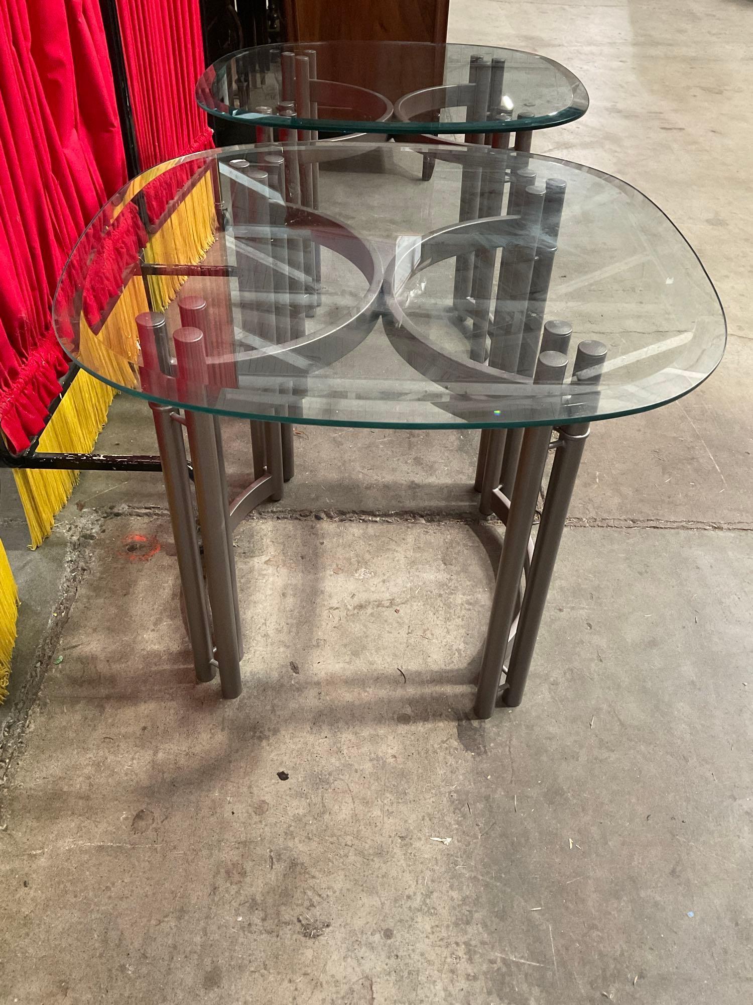 Pair of Modern Glass Topped Metal End Tables. Measures 26" x 21" See pics.