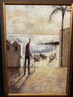 Framed Tres Barcas Print by Didier Lourenco, A man riding his bike near the shore
