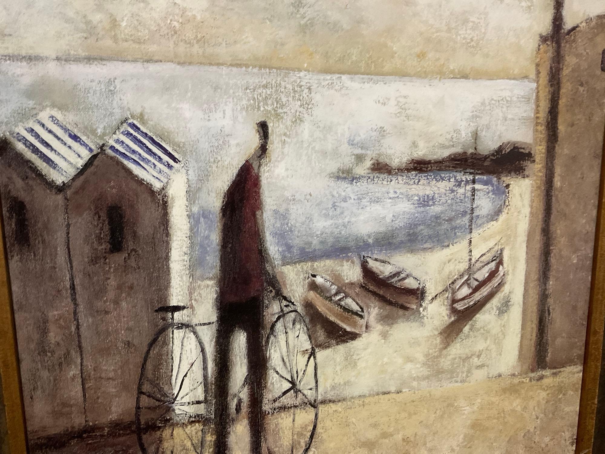 Framed Tres Barcas Print by Didier Lourenco, A man riding his bike near the shore