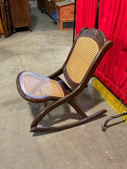 Beautiful Antique Wooden Folding Rocking Chair w/ Caned Seat & Floral Carved Back. See pics.