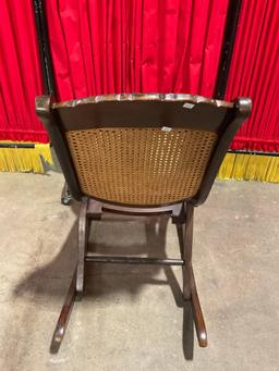 Beautiful Antique Wooden Folding Rocking Chair w/ Caned Seat & Floral Carved Back. See pics.