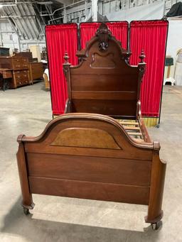 Antique Wheeled Wooden Twin Bed Frame w/ Intricately Carved Headboard w/ Burl Inlay. See pics.