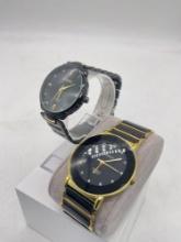 Pair of Strada and Genoa black and gold tone fashion watches in good cond