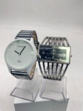 Pair of Strada fashion watches - stainless cuff bracelet and black and white watch