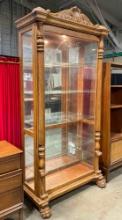 Pulaski Oak Finish Wood Lighted Curio Cabinet w/ Sliding Door. Excellent Condition. See pics.