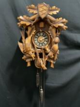 Vintage German Cuckoo Clock MFG Co. w/ Pinecone weights. 14h x 11w x 7.5d inches