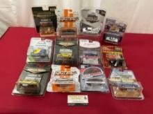 12 Die-Cast Cars sealed in packaging, incl. Dodge Muscle Cars, Plymouth, & more