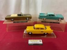 Trio of Model Cars, 1965 Dodge Polara, 1960 Chrysler & Taxi, in display case, 9 inches, 1:24 Scale