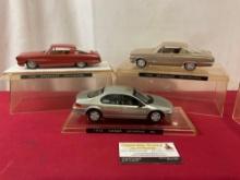 Three Model Cars, 1965 & 1966 Plymouth Barracuda, 1995 Dodge Stratus, in Display Cases, 11 inches