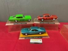 Trio of Model Cars, 1967 & 1968 Dodge Charger, 1966 Plymouth Barracuda, in display cases