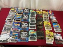 33 Hot Wheels Diecast Cars, assorted pieces in packaging, mostly MOPAR, Dodge, & more