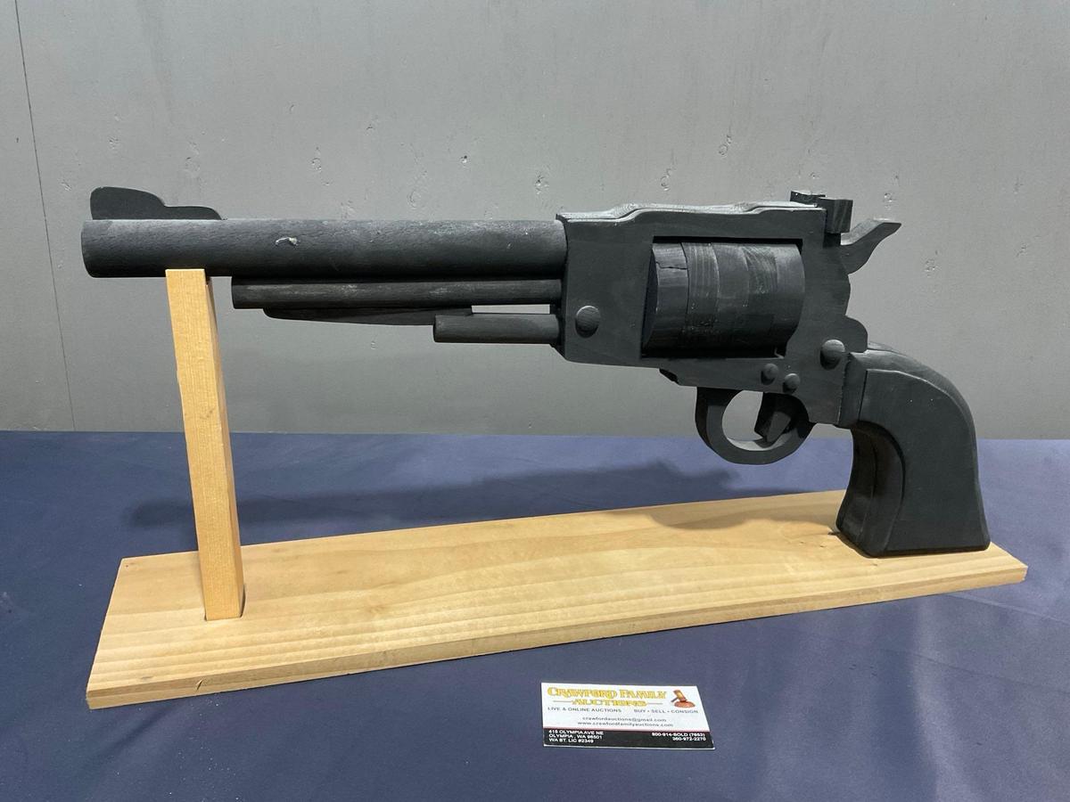 Large Wooden Revolver Figure painted black w/ Stand, the gun is 10h x 24L inches