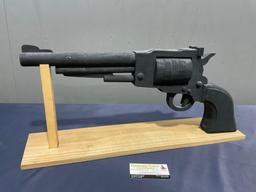 Large Wooden Revolver Figure painted black w/ Stand, the gun is 10h x 24L inches