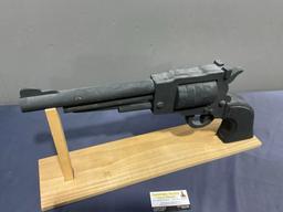 Large Wooden Revolver Figure painted black w/ Stand, the gun is 10h x 24L inches