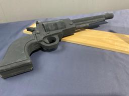 Large Wooden Revolver Figure painted black w/ Stand, the gun is 10h x 24L inches