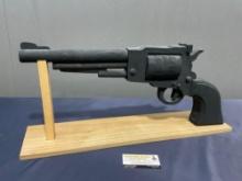 Large Wooden Revolver Figure painted black w/ Stand, the gun is 10h x 24L inches
