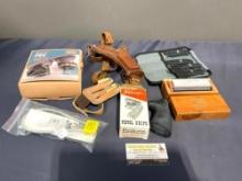 Yaktrax NIB, holster, Sharping stones, Pachmayr Pistol Grips,Browning 4 pc Elk knifes , gun lock