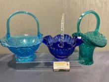 Three Pressed Glass Baskets, w/ 3 different colors, largest is 13.5h x 10.5w x 7d inches