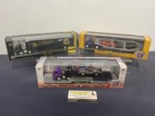 Trio of M2 Auto-Haulers in box, Dodge Truck & Trailer w/ 70s Charger & Super Bee Diecast Cars