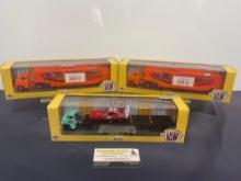 Trio of M2 Auto-Haulers in box, Dodge Truck & Trailer w/ 2 Chrysler 300C & Charger Diecast Cars