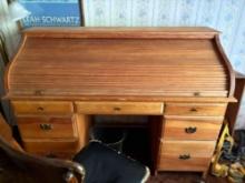 Full size Pine ? roll top desk in good condition comes w/ antique rolling office chair
