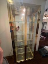 Lighted 4 shelf Glass display cabinet w/ gold trim tested works may need a light bulb.
