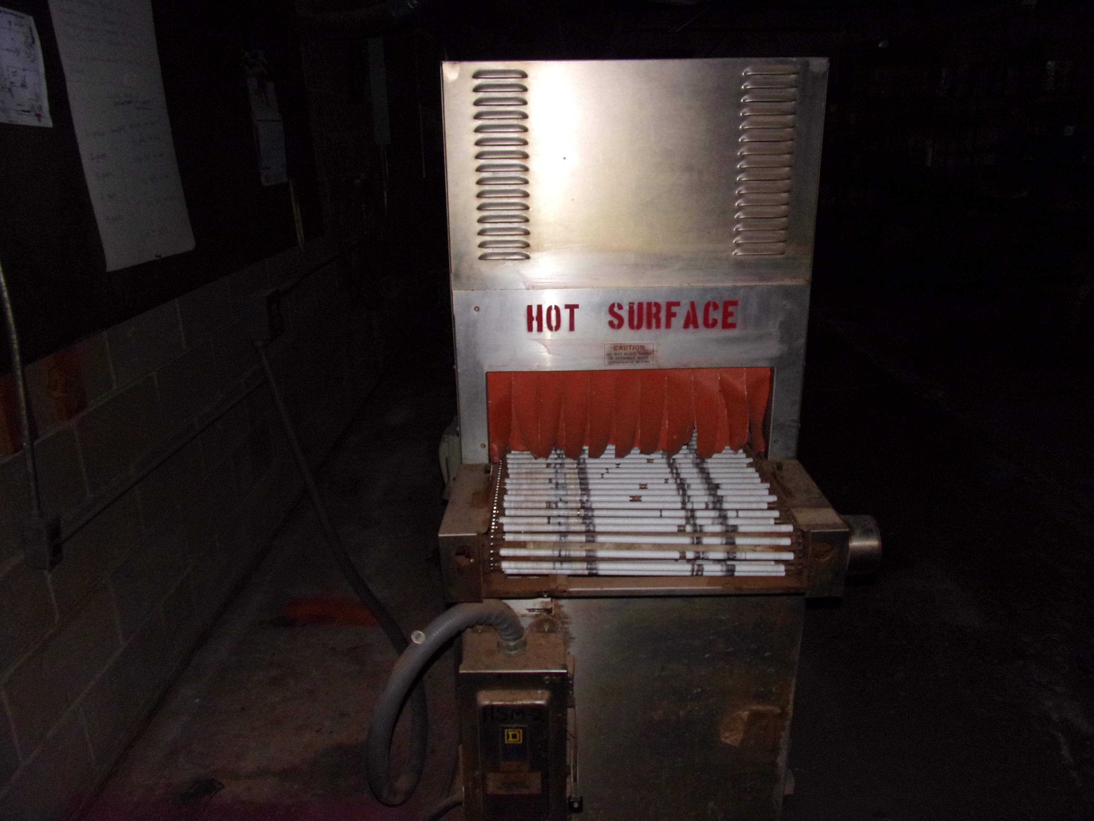 WELDOTRON TUNNEL HEAT SHRINK MACHINE W/INFEED CONVEYOR MDL 72215 S/N EV89372 W/220 VOLTS