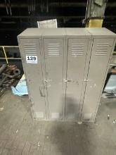 Metal Locker Unit With 4 Compartments. Located At 1602 Musser St., Muscatine, IA