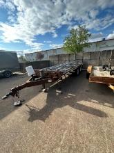 14000 LB Tandem Axle Deck Over Bumper Pull Flat Bed Trailer. Located At 1602 Musser St., Muscatine,