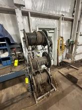(2) Metal Racks With Coils Of New Hydraulic Hose, Assortment Of Sizes