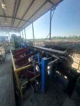 18ft Infeed Log Trough With 4 Arm  6ft 6inch Hydraulic Operated Log Sweep And Hydraulic Drive. Sells