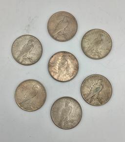 7 Peace Dollars: 1922-S, 1922-D, 1922-No Mint Mark, 2 1923-D, 2 1923-No Min