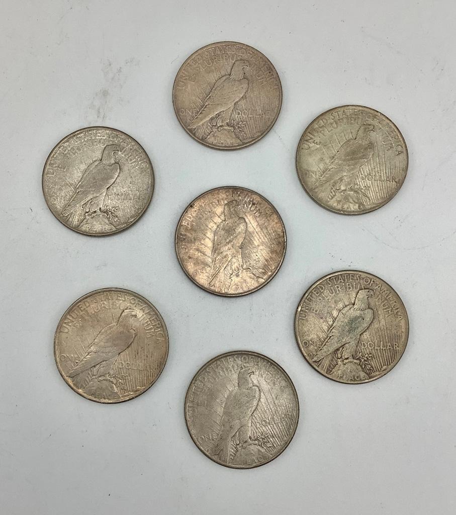 7 Peace Dollars: 1922-S, 1922-D, 1922-No Mint Mark, 2 1923-D, 2 1923-No Min