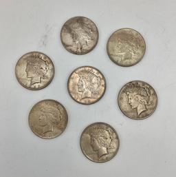 7 Peace Dollars: 1922-S, 1922-D, 1922-No Mint Mark, 2 1923-D, 2 1923-No Min